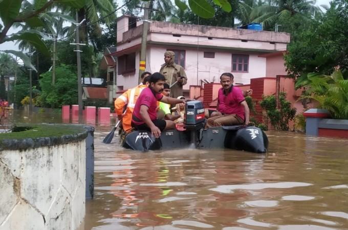 Kerala floods Red alert issued in 4 districts, over 1,385 people