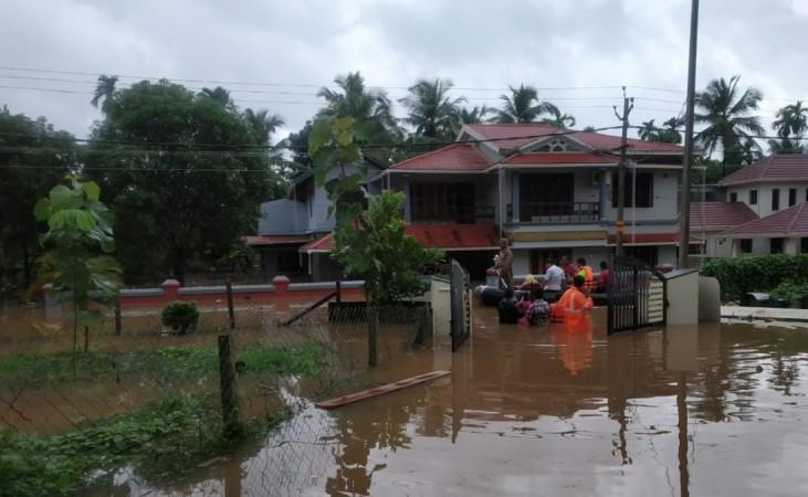 fire brigade conducting rescue operations at Kerala due to the heavy floods Kerala floods 2019
