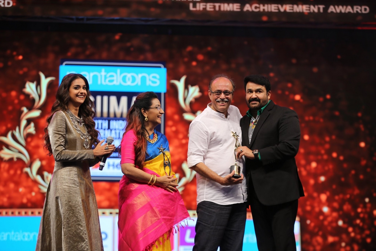 Mohanlal with Menaka Suresh and Suresh Kumar