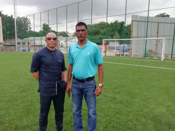 Terry Phelan and Alfred Fernandes. Terry Phelan and Alfred Fernandes