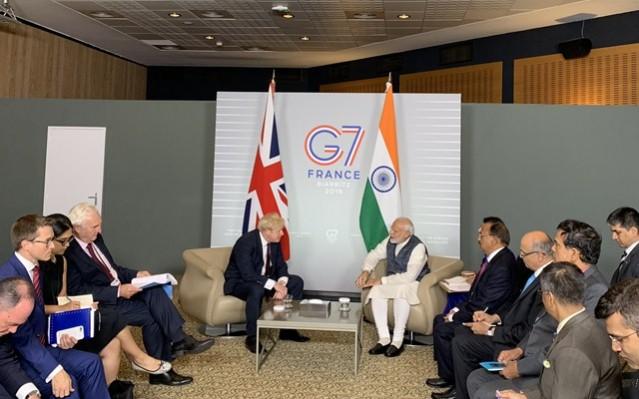 Indian PM Narendra Modi meets UK PM Boris Johnson Narendra Modi Boris Johnson
