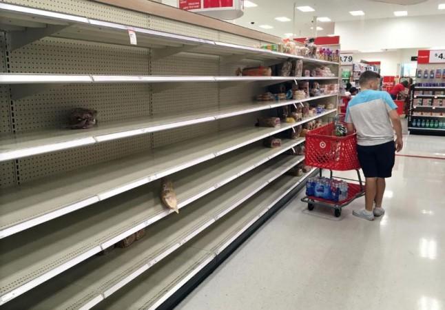Shoppers encounter empty shelves at a store while buying supplies ahead of the arrival of Hurricane Dorian in Kissimmee, Florida, US August 29, 2019. Hurricane Dorian