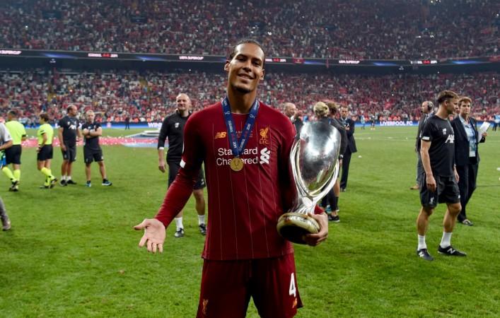Virgil Van Dijk with the Champions Trophy. Virgil Van Dijk