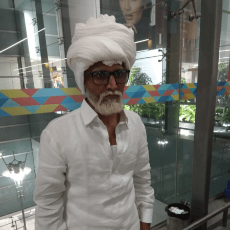 man dressed as 80 year old in Delhi airport