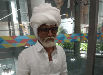 man dressed as 80 year old in Delhi airport