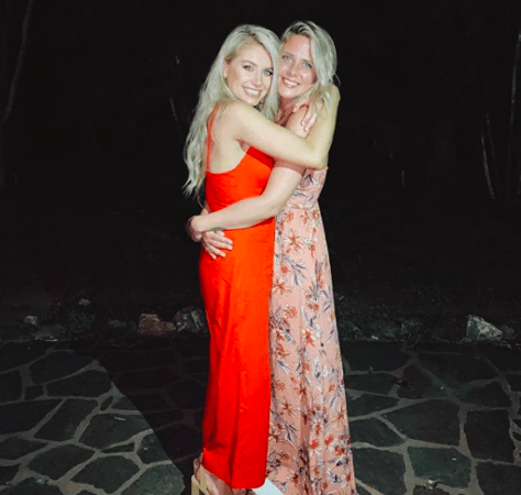 Demi Burnett (left)