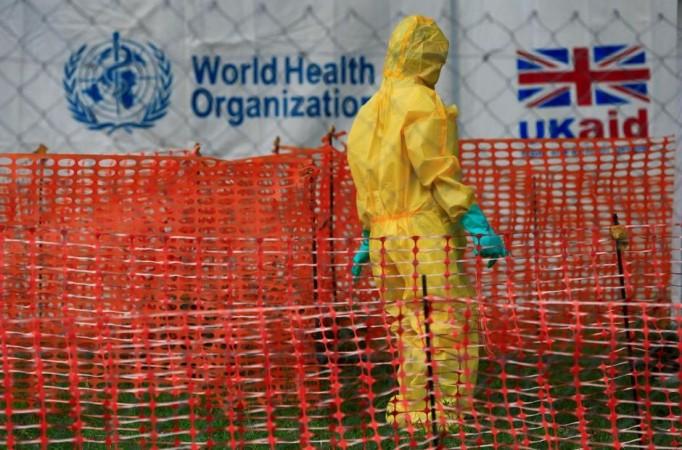 A person dressed in Ebola protective apparel is seen inside an Ebola care facility in Bwera, Uganda, June 14, 2019. Ebola