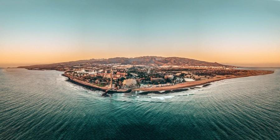 A promotional image of a Thomas Cook destination. The Thomas Cook liquidation has forced UK Prime Minister Boris Johnson's government to undertake the biggest peacetime repatriation of UK citizens stranded around the globe. Thomas Cook grounded