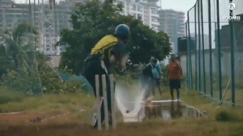 Tendulkar batting on the submerged pitch Sachin Tendulkar