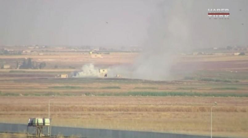 Explosion in the border town of Tel Abyad, Syria, as seen from Akcakale, Turkey October 9, 2019. Turkey
