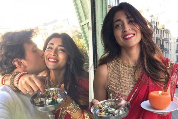 Shriya Saran celebrates Karva Chauth in Barcelona. Shriya Saran being kissed by her Husband