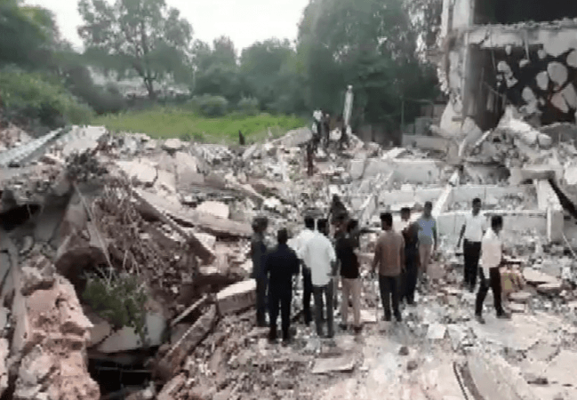 Rescue and search operation is underway. vadodara building collapse