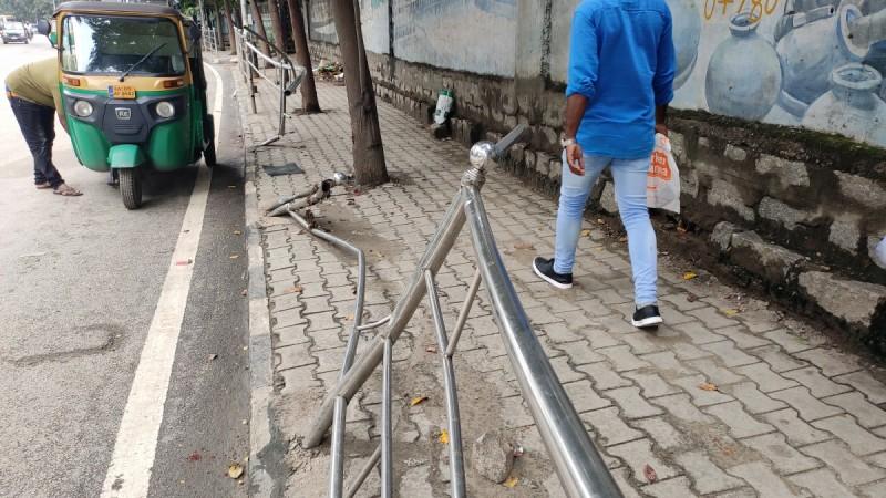 Steel railings in a dialpidated condition in Seshadri Road posing great threat to pedestrians Steel railings in a dialpidated condition in Seshadri Road posing great threat to pedestrians