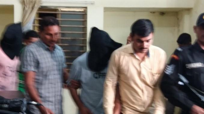 Two accused in Kamlesh Tiwari murder case being taken by the police. Image: Twitter Suspects in Kamlesh Tiwari murder