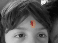Shah Rukh Khan trolled for sporting tilak