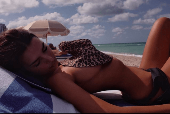 Emily Ratajkowski topless picture from beachside Emily Ratajkowski
