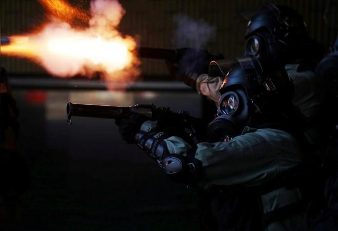 Police fire tear gas at Hong Kong Polytechnic University in Hong Kong, China, November 18, 2019 Hong Kong police