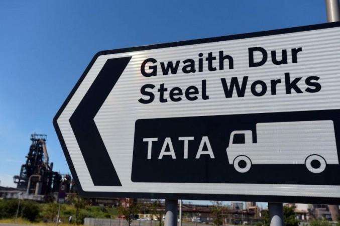 A road sign points to the Tata steelworks in Port Talbot, Wales. Tata
