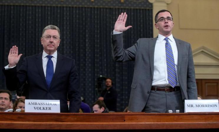 Former US special envoy to Ukraine Kurt Volker, and Tim Morrison, former senior director for European and Russian affairs on the National Security Council, are sworn in to testify before a House Intelligence Committee hearing as part of the impeachment inquiry into US President Donald Trump on Capitol Hill in Washington, US, November 19, 2019. Ambassador Kurt Volker