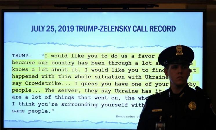A police officer stand in front of a monitor as Jennifer Williams, a special advisor to Vice President Mike Pence for European and Russian affairs and Lt Colonel Alexander Vindman, director for European Affairs at the National Security Council, testify before a House Intelligence Committee hearing as part of the impeachment inquiry into US President Donald Trump as Capitol Hill in Washington, US, November 19,2019. Trump impeachment