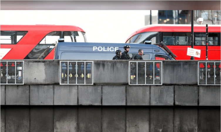 Police officers and emergency staff work at the site of an incident at London Bridge in London, Britain, November 29, 2019. London terror attack