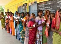 Raichur: Women voters wait in a queue to cast their votes for the third phase of 2019 Lok Sabha elections, at a polling station in Karnataka's Raichur, on April 23, 2019