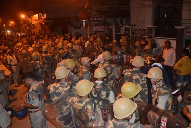 Security increased as villagers gathered on Khiribir Road claiming that the Jama Masjid mosque signboard was damaged. Twitter/IANS UP Mosque damaged