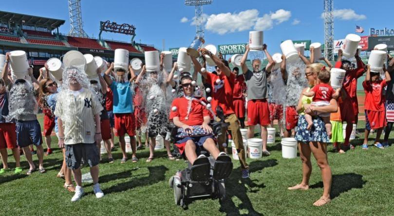 On July 31, 2015, Pete Frates, his wife and daughter participate in the Ice Bucket Challenge. Staff Photo by Arthur Pollock. Image: Twitter Pete Frates