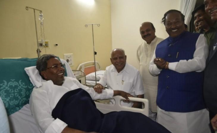 Karnataka CM BS Yediyurappa and other BJP leaders visited Congress leader Siddaramaiah who is admitted in a hospital.