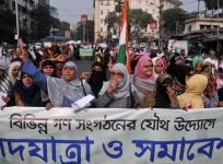 Members of Muslim community participate in a protest rally against CAB