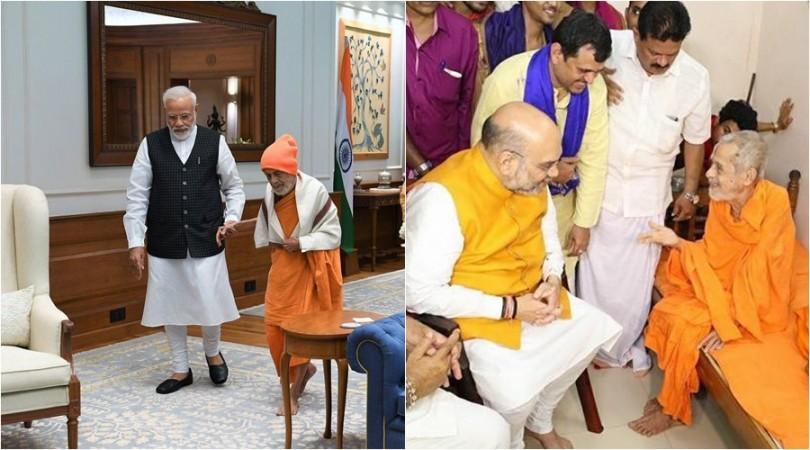 Narendra Modi and Amit Shah with Pejavara Mutt Seer Vishwesha Teertha Swami Narendra Modi and Amit Shah with Pejavara Mutt Seer Vishwesha Teertha Swami