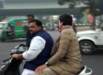 Lucknow: Congress General Secretary Priyanka Gandhi Vadra being driven on a scooty by party leader Dheeraj Gurjar after the police tried to block her way to the retired activist IPS officer S R Darapuri's residence, in Lucknow on Dec 28, 2019. Priyanka's