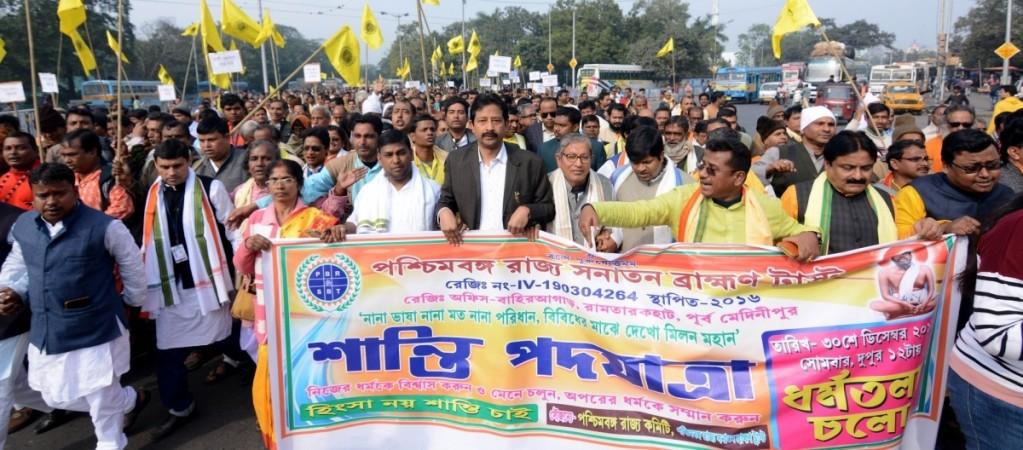 Activists of Paschim Banga Rajya Sanatan Brahman Trust (PBRSBT) participate in a protest rally against CAA, NRC. CAA protests