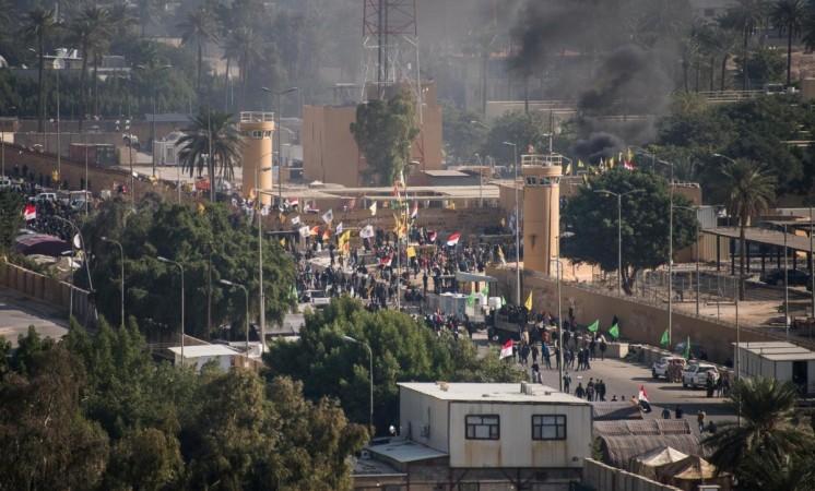 Iraqi security forces deploy during the second day of protests at the US embassy in Baghdad, Iraq. US embassy in Baghdad