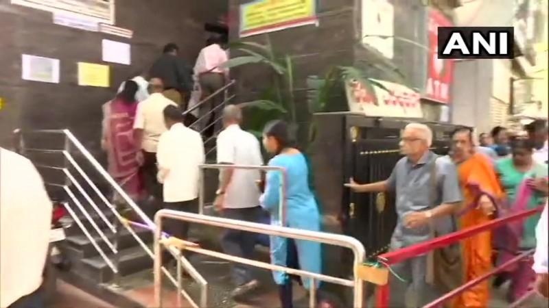 Depositors in a queue Bengaluru bank