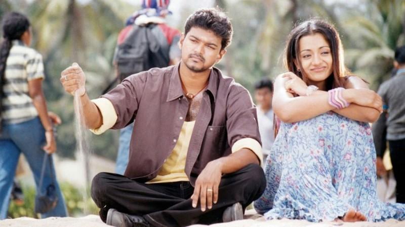 A movie still from Thalapathy Vijay and Trisha from their Tamil film. Thalapathy Vijay with Trisha
