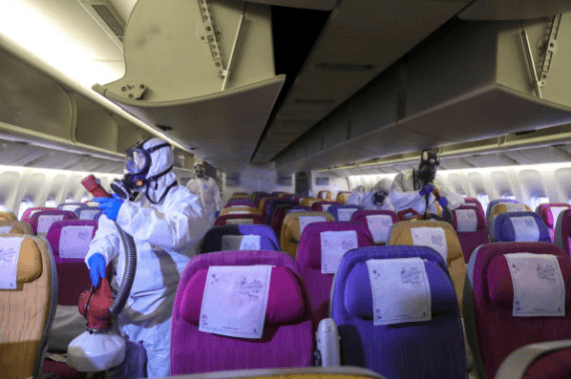 Members of the Thai Airways crew disinfect the cabin of an aircraft of the national carrier during a procedure to prevent the spread of the coronavirus at Bangkok's Suvarnabhumi International Airport, Thailand, January 28, 2020. Members of the Thai Airways crew disinfect the cabin of an aircraft of the national carrier during a procedure to prevent the spread of the coronavirus at Bangkok's Suvarnabhumi International Airport, Thailand, January 28, 2020.