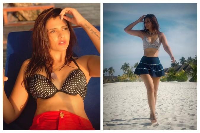 Watch Dalljiet Kaur Flaunts Her Curves In A Bralette As She Holidays With Rumoured Beau In 
