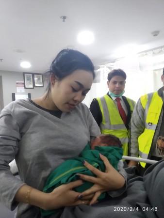 Both the mother and the baby are doing fine, officials said. Baby on flight