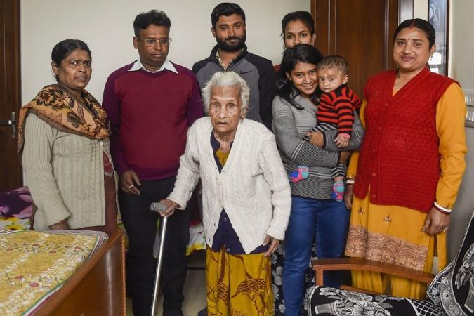 110-year-old Kalitara Mandal poses for photographs along with her family members at her residence at Chittaranjan Park, Delhi Kalitara Mandal