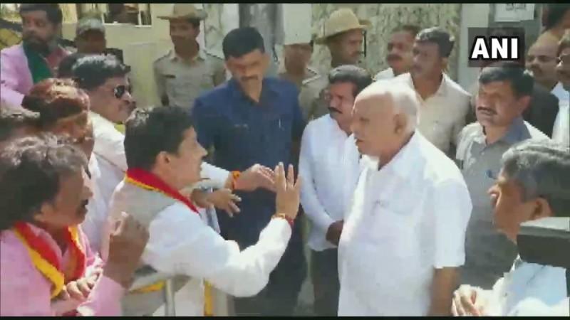 Yediyurappa meets protesters. Yediyurappa