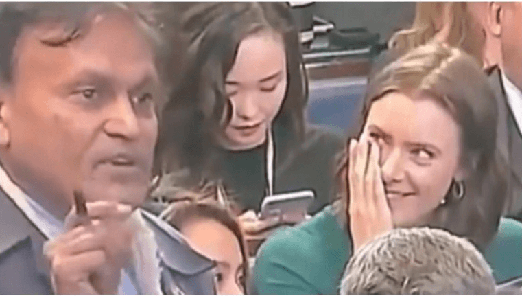 As he was asking the question, Bowden, who was sitting behind him, was seen asking someone that who is this guy and then keeping her palm on her cheek and laughing away at Raghubir making faces at him. american journalist
