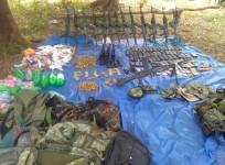 Maoists display huge cache of weapons looted from security personnel during ambush