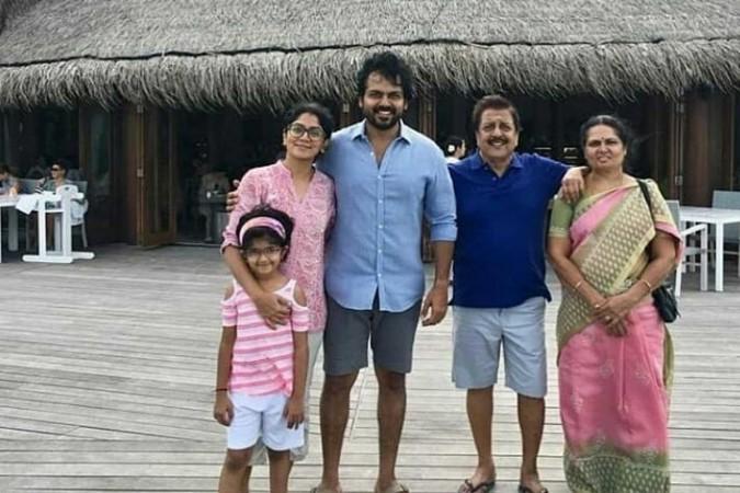 Karthi during a vacation with wife, daughter, and parents. Karthi