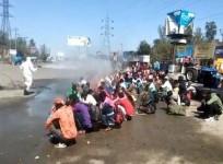 Disinfectant sprayed on UP labourers