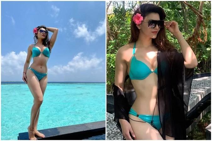 Urvashi Rautela in Bikinis & Sports Bras