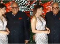 Boney Kapoor spanking Urvashi Rautela's back