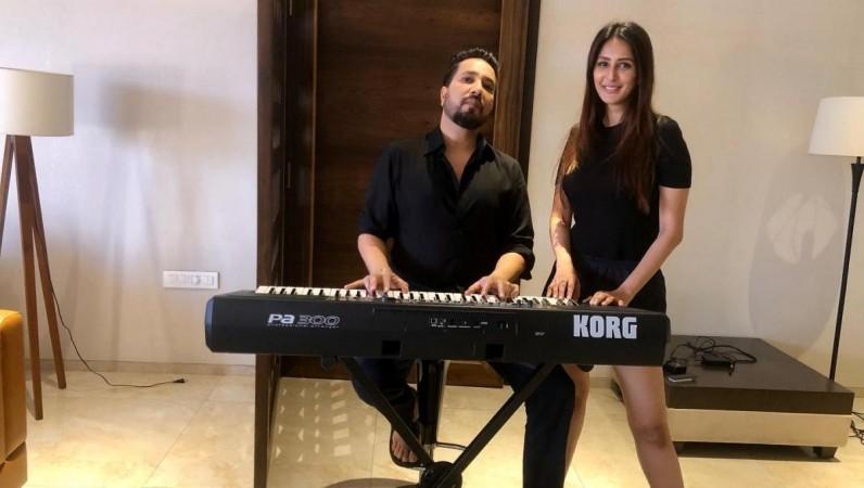 Mika Singh and Chahat Khanna. Mika Singh and Chahat Khanna