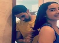 Rajkummar Rao giving a haircut to Patralekhaa