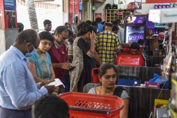 people rush in markets amid lockdown